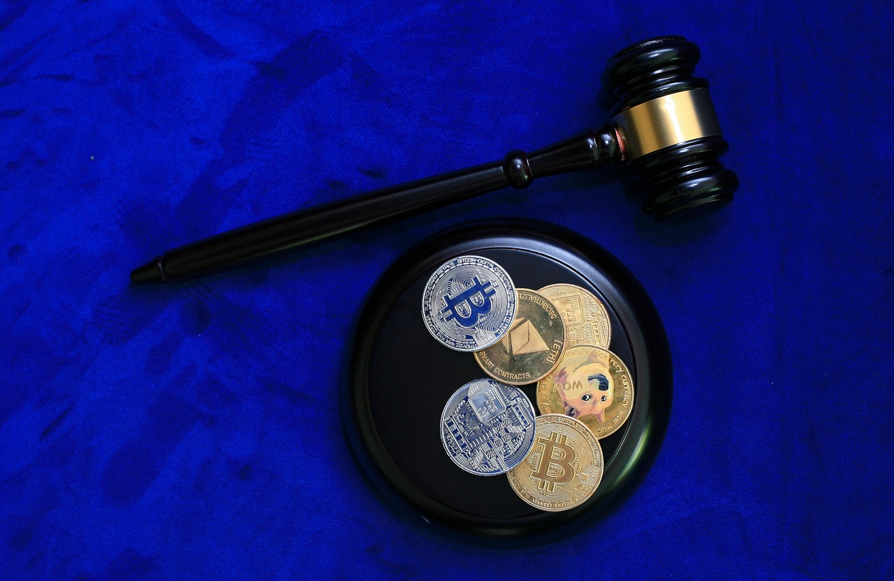 A legal gavel resting next to a medical file symbolizing the external review process.