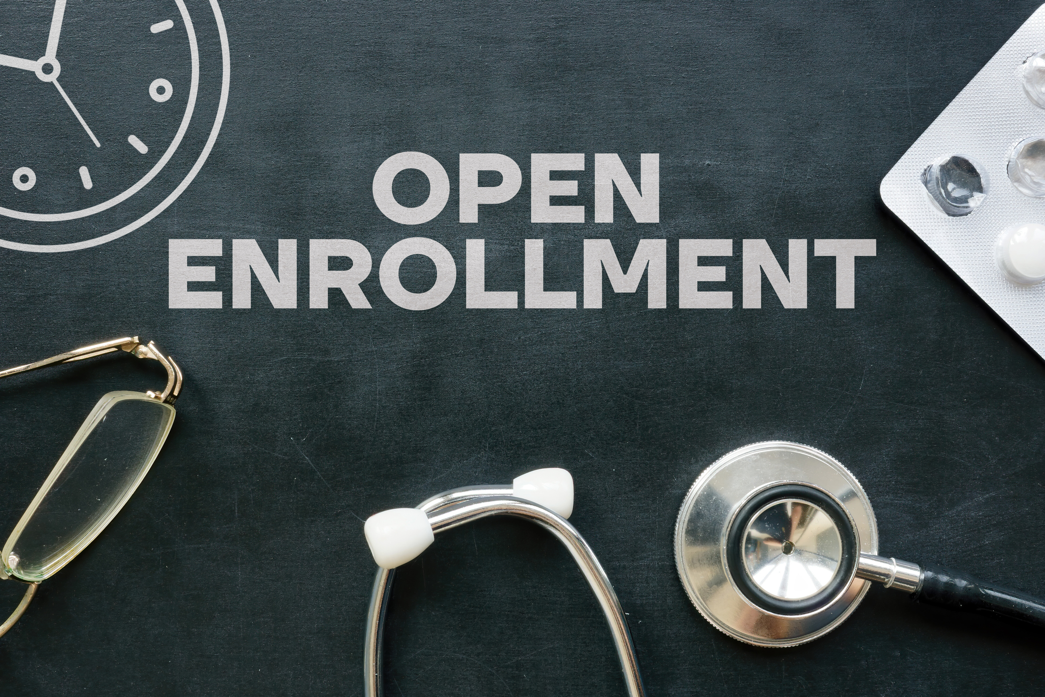 Clean text graphic that says Open Enrollment.