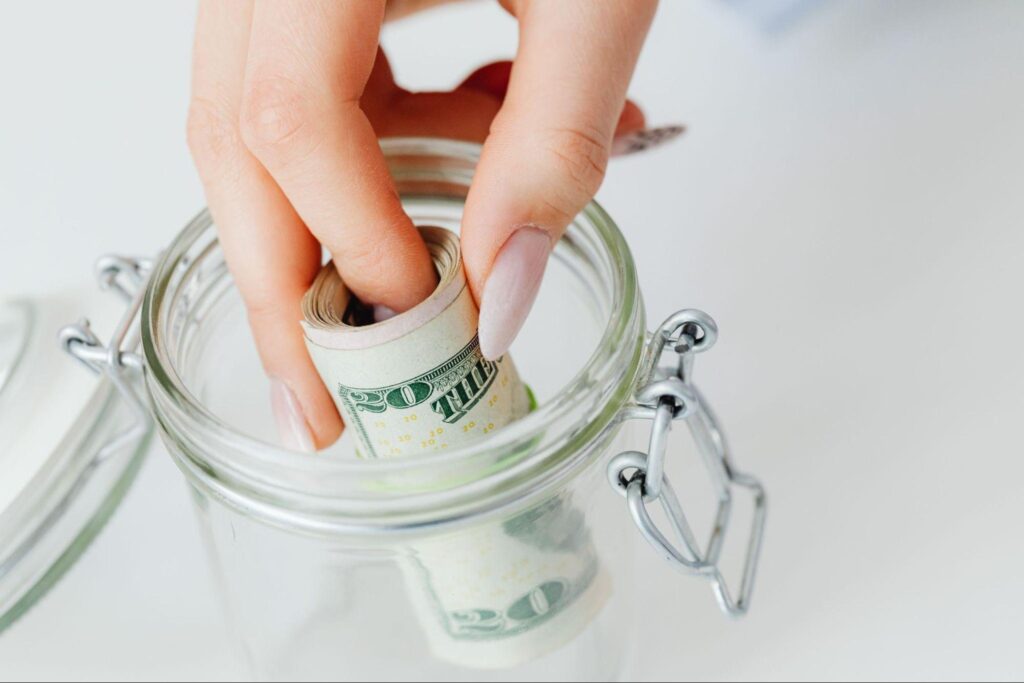 A desktop scene with financial planning tools and a calculator.