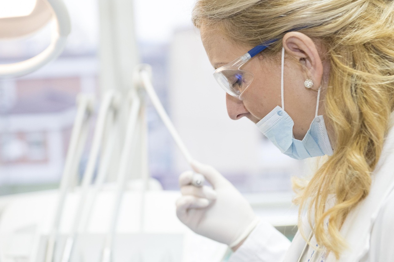 A physician writing a letter of medical necessity to support a patient's insurance appeal.
